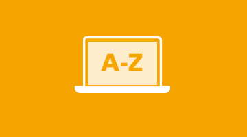 Aufgeklappter Laptop mit der Aufschrift A bis Z